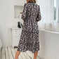mid-length turtleneck pleated print dress